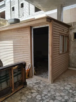 دار من الخشب المعالج