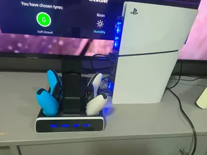 playstation 5 with controller and charging station
