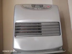 صوبه يابانيا الصوبه كاز وكهرباء اقتصاديه جدا جدا الكهرباء عباره عن مروحه بتدفع الهواء الساخن للخارج