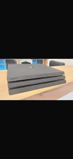 Ps4 pro new for sale  with 2 controllers and stand with 3 games