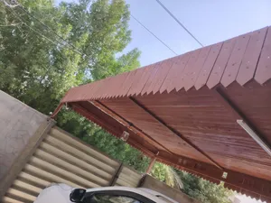 مضلة كراج هيكل حديد مغلف خشب