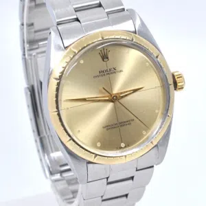 ORIGINAL ROLEX OYSTER PERPETUAL  A stainless steel and gold automatic bracelet watch