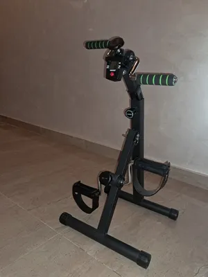 نوع الجهاز: دراجة تمارين مصغرة مزدوجة للجسم العلوي والسفلي (Dual Pedal Exerciser).