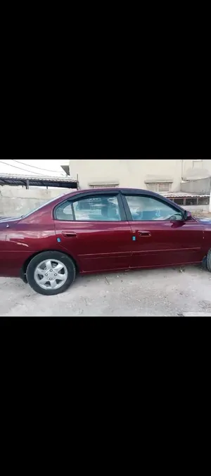 سيارة هيونداي النترا 2001 صالون أحمر مرخصة بنظام أوتوماتيك