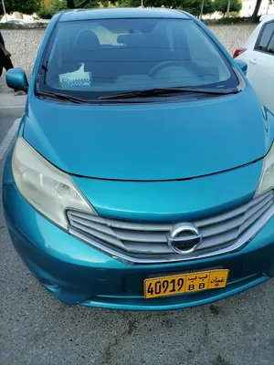 2014 Nissan Versa Hatchback, blue color, used and in excellent condition, licensed.
