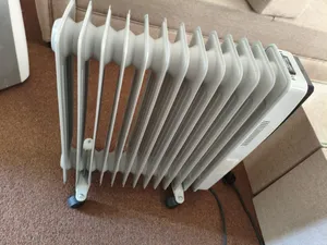 دفاية كهرباء زيت كويتية ماركة ونسا مع هيتر هواء للتوزيع