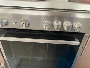 ثلاجه وغاز بو اربع عيون نظاف الثلاجه