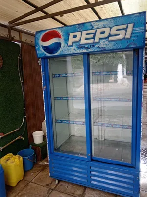 ثلاجه عرض بابين وفريزر انفيرتر بحاله الوكاله