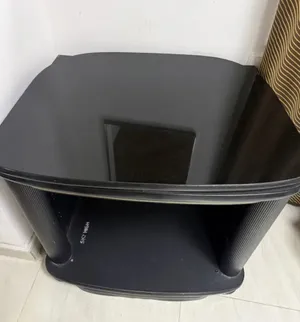 Black Tv stand with moveable glass top