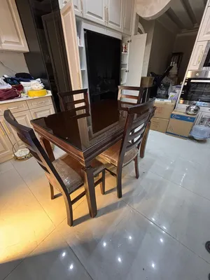 Solid wood dining table and 4 chairs with glass top