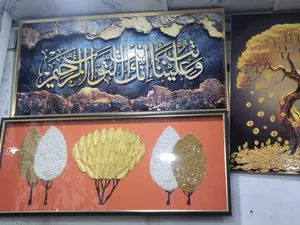 ساعات وصور ومرايه جدران استيل.
