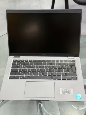 Dell Core i5 11th Gen, 8GB RAM, 256GB SSD, 14-inch screen.
