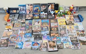 كمية افلام وسيديهات والعاب مقتنيات lot dvds