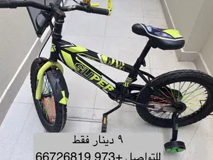 دراجة هوائية للأطفال (سيكل) بحالة ممتازة ومع تواير مساعدة – بسعر لقطة!