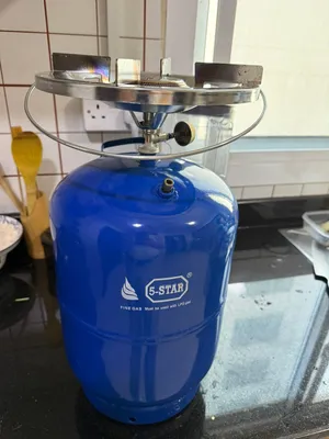 Gas cylinder with stove 5 kg ( Half filled)