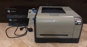طابعة اتش بي ليزر ملونة (HP Laserjet CP1515n) بحالة ممتازة