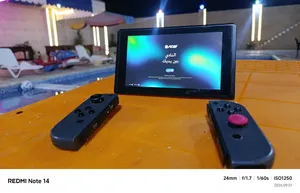 Nintendo switch v2 مهكر G512 مع قبضة كيم سير نوفا لايت 2 مع كامل اغراضو جاهز عل لعب
