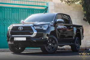 Toyota Hilux 2022 البكب وارد الوكيل و بحالة ممتازة جدا اللون : اسود من الداخل اسود