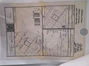 للبيع ارض صناعيه في صحم مبنى جديد وموقع ممتاز حوالينه مباني ماجره