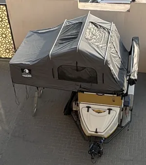 Compact Off-road Camper Trailer with Roof Tent and Storage Boxes