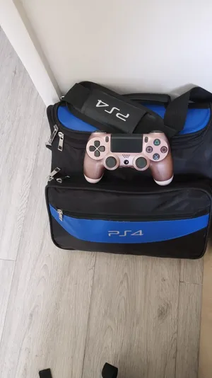 Sony PlayStation 4 with 4 controls and 6 games