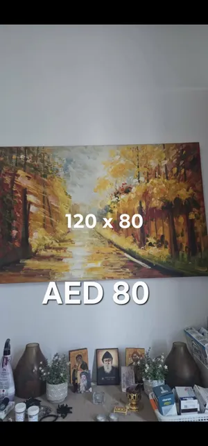 assorted paintings different sizes