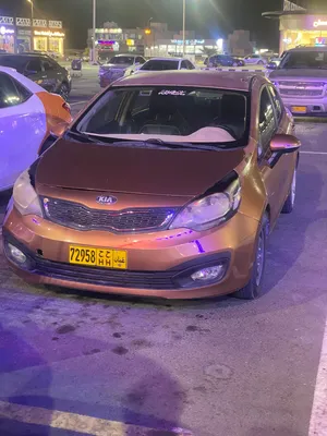 2012 Kia Rio EX Sedan - Orange, Gasoline, Leather Interior, Bluetooth, Licensed