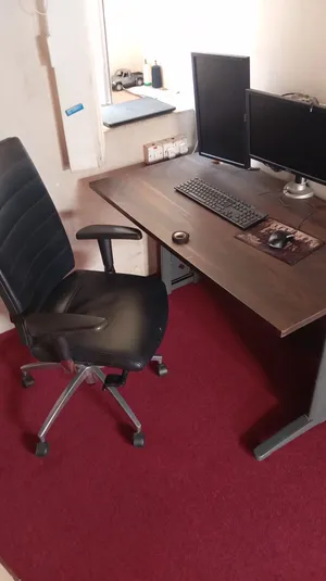 Wooden office table with leather office chair