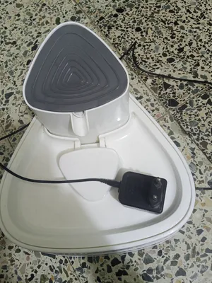 نافورة ماء شرب للقطط
