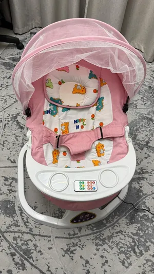 Electric baby swing/rocker for newborns. Bought new, used once only — excellent condition.