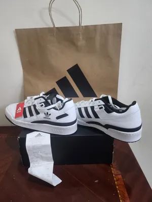 Adidas Forum Low / Forum Low CL in the White / Black colorway.