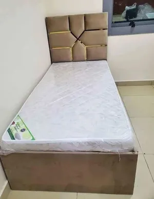 selling brand new single bed with mattress with home delivery