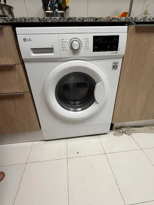 Lg washing machine just for 100 omr 7 kg perfect condition no default pickup from bousher muscat