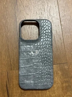 new iphone 17 phone leather with AB initials on it