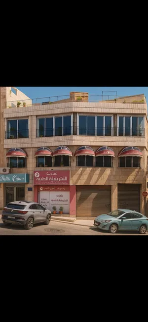 مجمع تجاري بمنطقة الاشرفية مخازن و طابقين و + روف  5 محلات و 7 شقق
