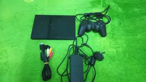 Playstation 2 slim with controller and cables