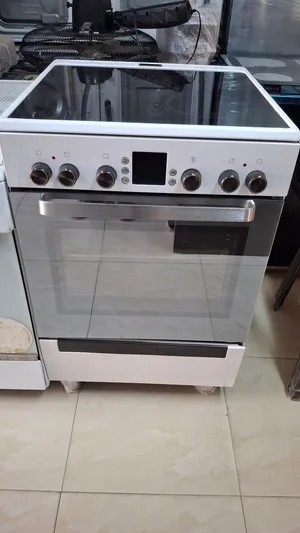 غاز 4 عيون كهربائي نوع بوش 60سم×60سم كهرباء كامل اربع عيون كهرباء وفرن كهرباء كامل بحاله ممتازه جدا