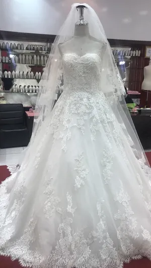فستان زفاف تم شرائه من بوتيك فجده كان اسمه برونوفياس