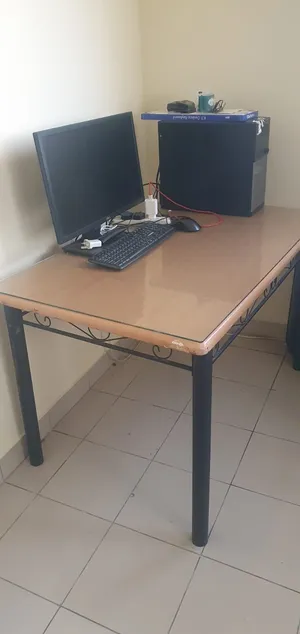 Glass Covered Metallic Wooden Table used for office works