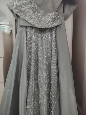فستان سهره زيتوني مستعمل لبسه واحد بس