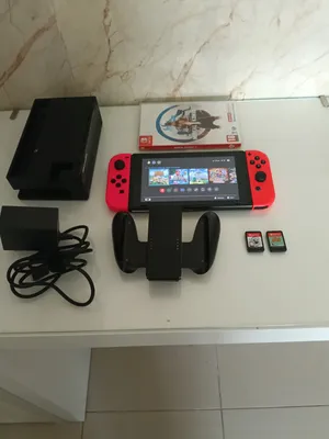 Nintendo switch console with controller and games