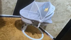سرير هزاز اطفال