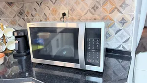 مايكرويف شارب مستعمل بحالة ممتازة للبيع microwave Sharp