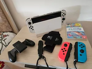 Nentendo switch oled مع فل إضافات