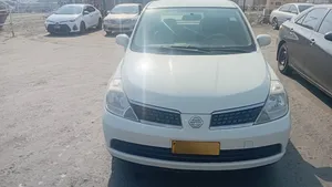 نيسان تيدا 2008 ابيض اللون.جير عادي .بحاله ممتازة ونظيفه .جير مكينه .وبودي