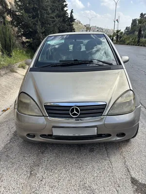 قابل للبدل مرسيدس A140 موديل99 ماتور 1600cc ماشية 120 الف عداد اصلي مرخصة ل شهر 1/2027 5 جنطات