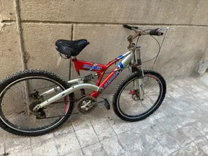 عجلة مقاس 26 سرعات دبل مساعدين (الذهبي / Rallex) فرامل ديسك great condition just  Abit of rust