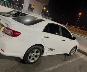 2013 Toyota Corolla XLI Sedan in White with GCC Specs - Excellent Condition