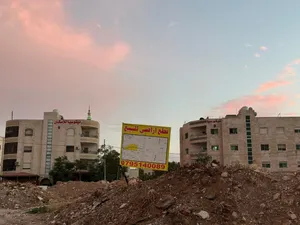 ارض للبيع في ضاحيه الحاج حسن بجانب كابيتال بنك