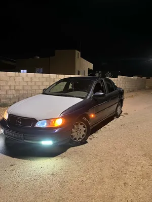 سيارة أوبل أوميغا 1999 بنزين بحالة ممتازة مع مواصفات خليجية ومنتهي ترخيص بتوخذها مرخصة سنة